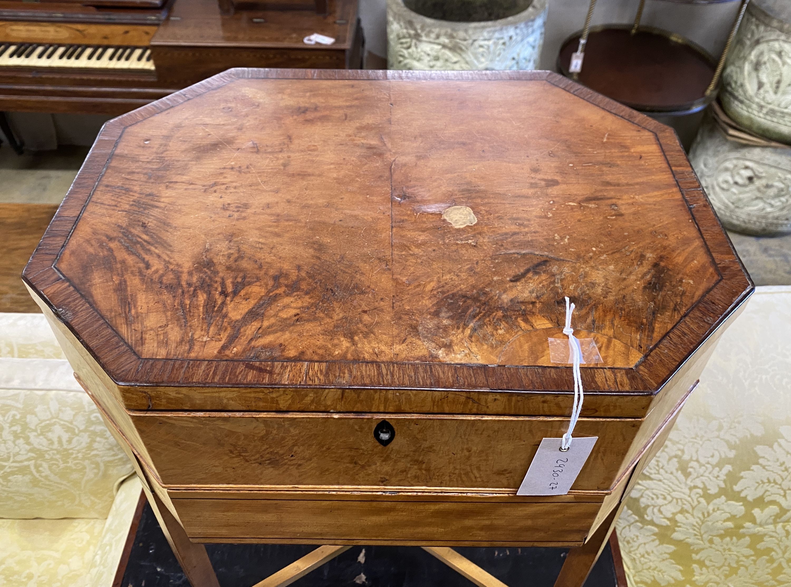 A Georgian design banded satinwood octagonal sewing table, width 49cm, depth 36cm, height 77cm